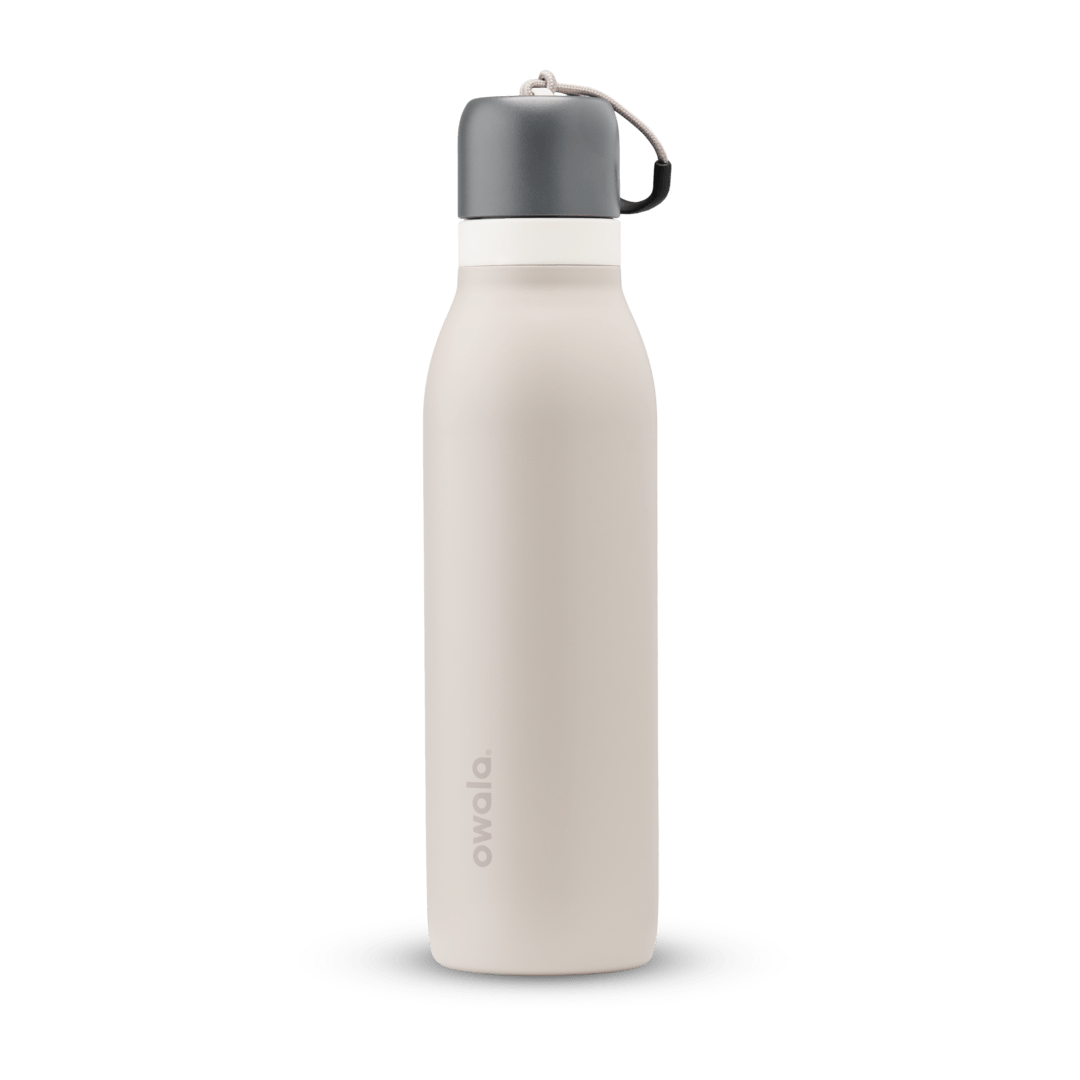 FreeSip Twist UK 18oz, off-white cream insulated water bottle with gray twist cap and carry loop